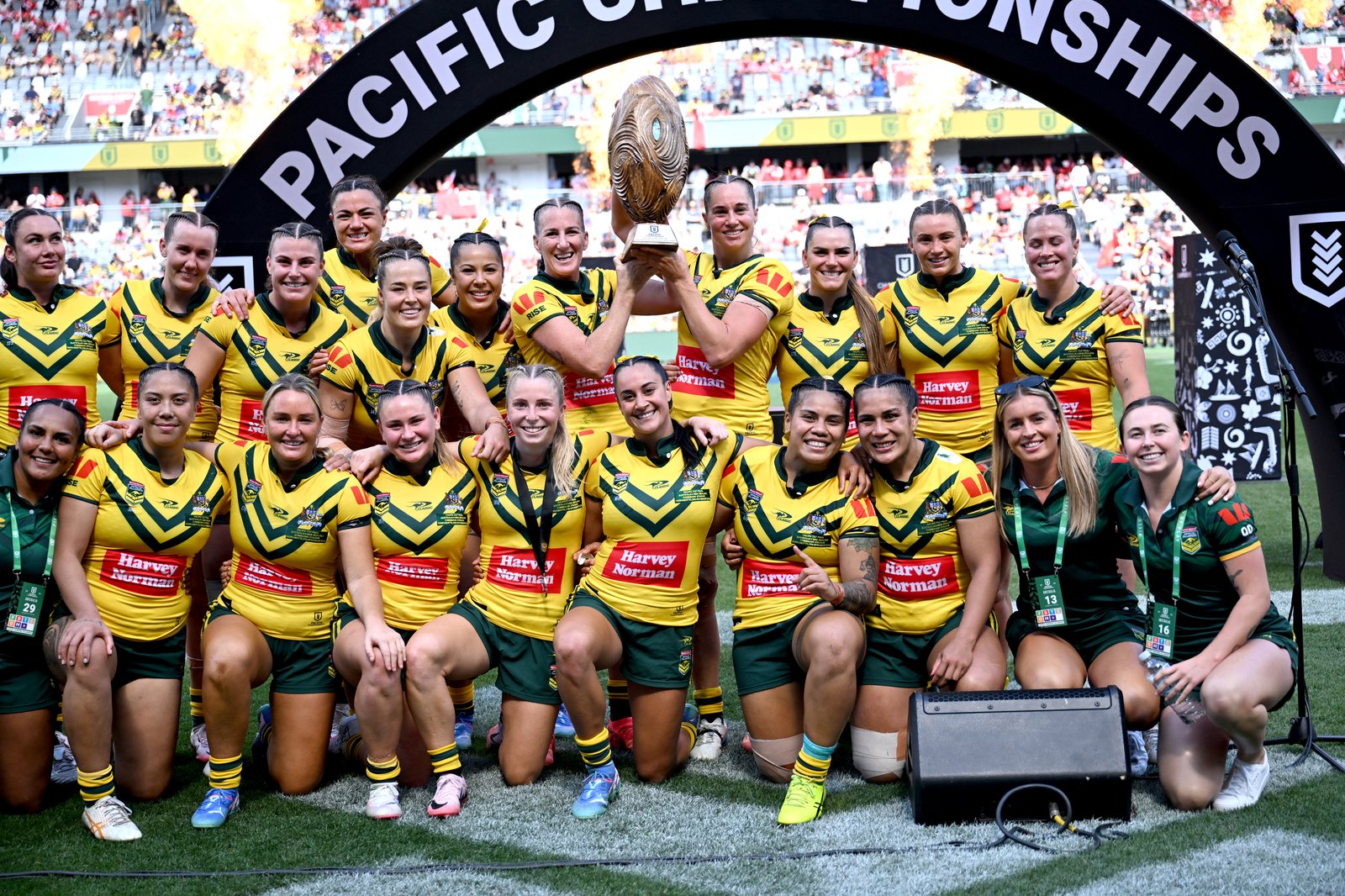 Jillaroos celebrating with the trophy